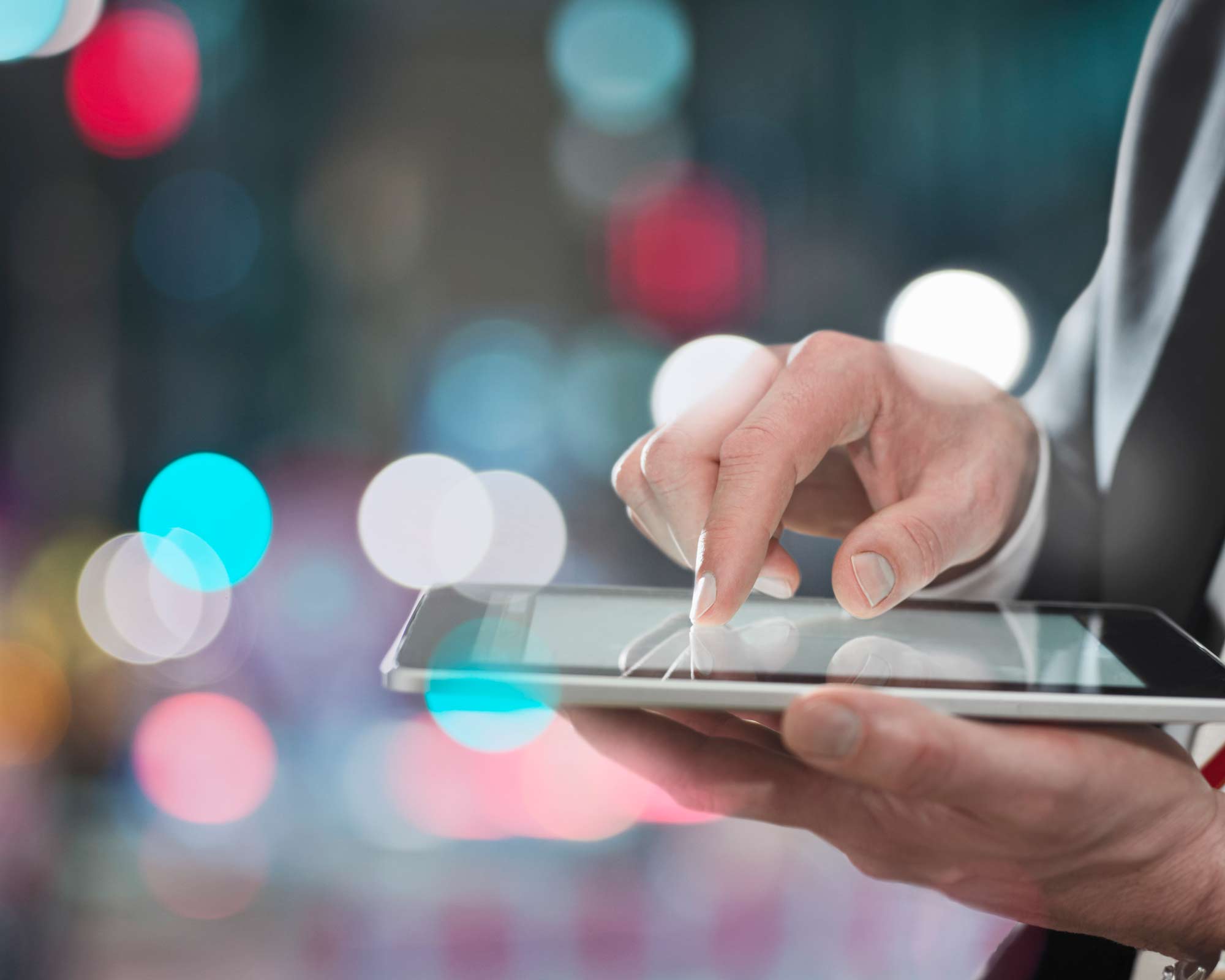 hand on iPad