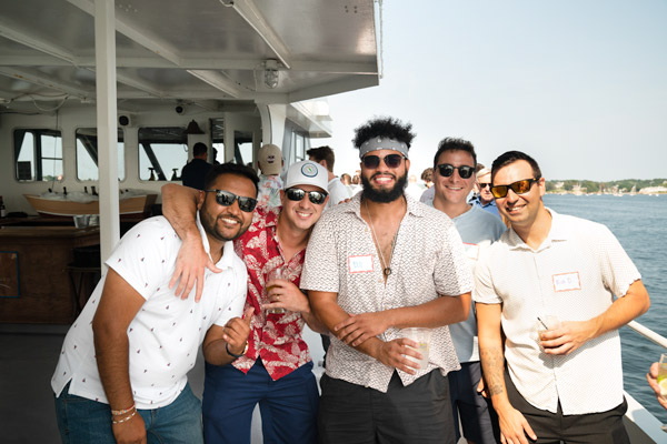 group of Reveneer employees on a boat